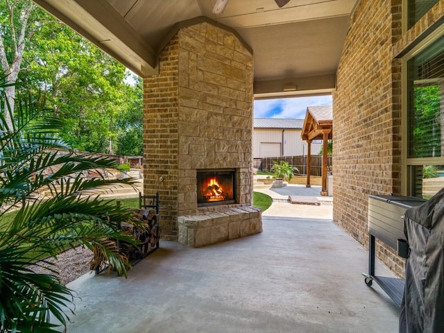 2201 Mountain Creek Ct, Wylie, TX 75098 - view of patio featuring an outdoor stone fireplace