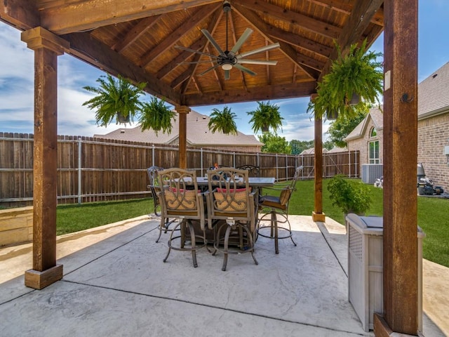2201 Mountain Creek Ct, Wylie, TX 75098 - view of patio featuring a gazebo, outdoor dining space, a ceiling fan, and central AC