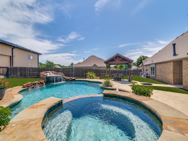 2201 Mountain Creek Ct, Wylie, TX 75098 - view of pool with a pool with connected hot tub, a gazebo, and a patio