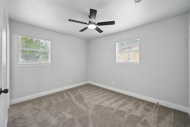 3651 Cindy Dr, Fort Worth, TX 76111 - carpeted spare room featuring plenty of natural light, baseboards, and a ceiling fan