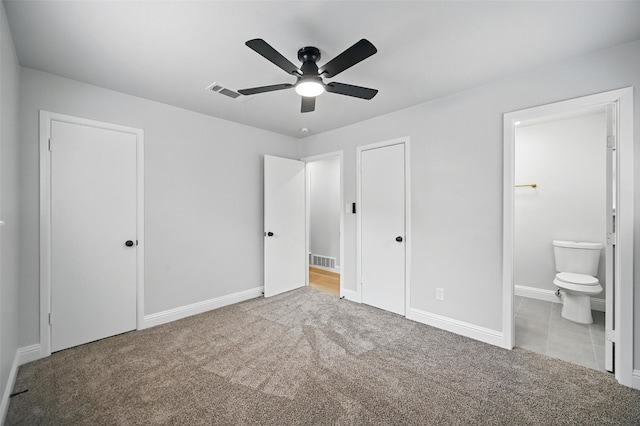 3651 Cindy Dr, Fort Worth, TX 76111 - unfurnished bedroom featuring carpet flooring, ensuite bath, baseboards, and a ceiling fan