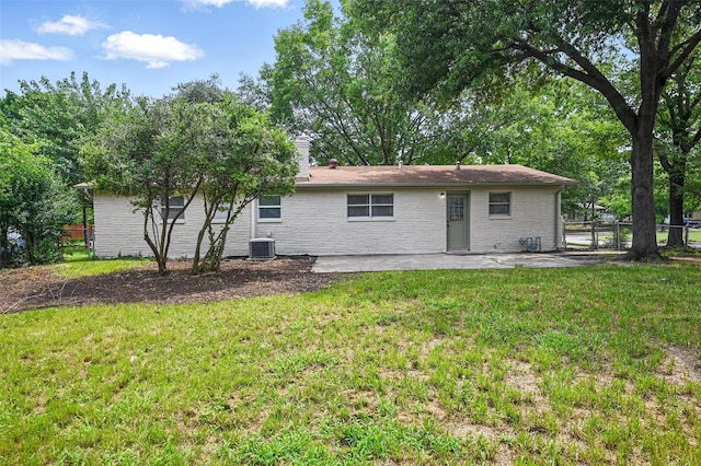 3651 Cindy Dr, Fort Worth, TX 76111 - rear view of property with a patio area, central AC unit, and brick siding