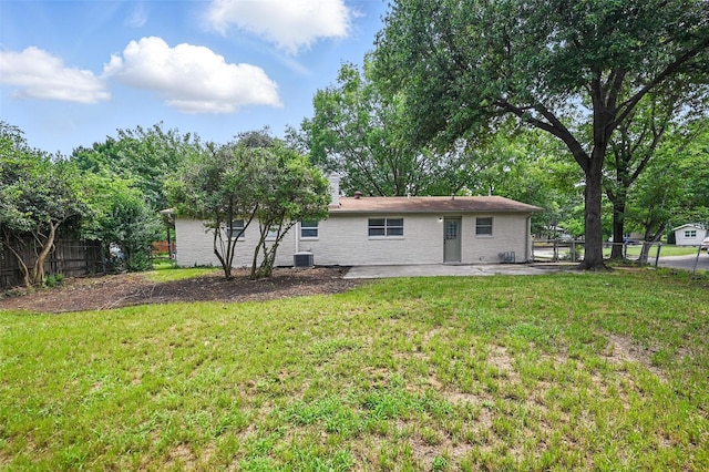 3651 Cindy Dr, Fort Worth, TX 76111 - back of house featuring central AC and a patio