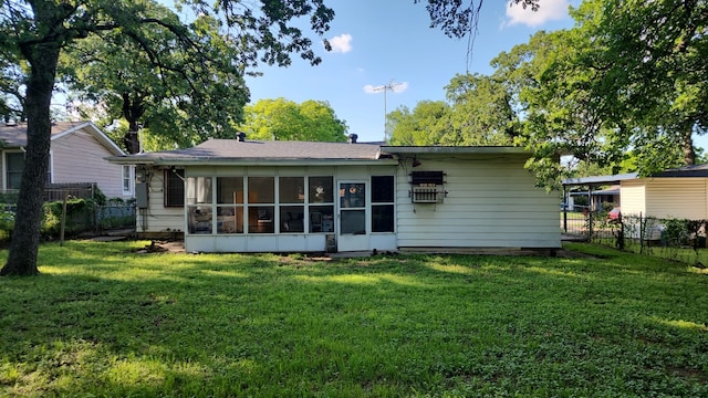 5612 Wainwright Dr, Fort Worth, TX 76112 - rear view of property featuring a sunroom