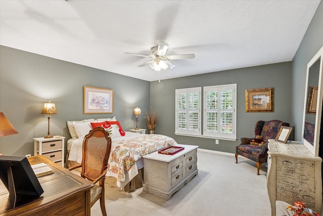 1811 Whitney Dr, Richardson, TX 75082 - bedroom with light carpet, baseboards, a ceiling fan, and a desk