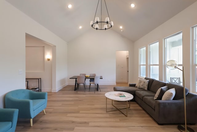 2836 Ave L, Fort Worth, TX 76105 - living room featuring a chandelier, light wood-type flooring, baseboards, high vaulted ceiling, and recessed lighting