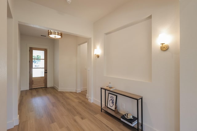 2836 Ave L, Fort Worth, TX 76105 - hallway with light wood-style floors and baseboards