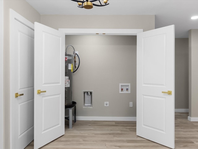 1013 Nueva Tierra St, Grand Prairie, TX 75052 - laundry area featuring washer hookup, water heater, light wood-type flooring, baseboards, and a chandelier