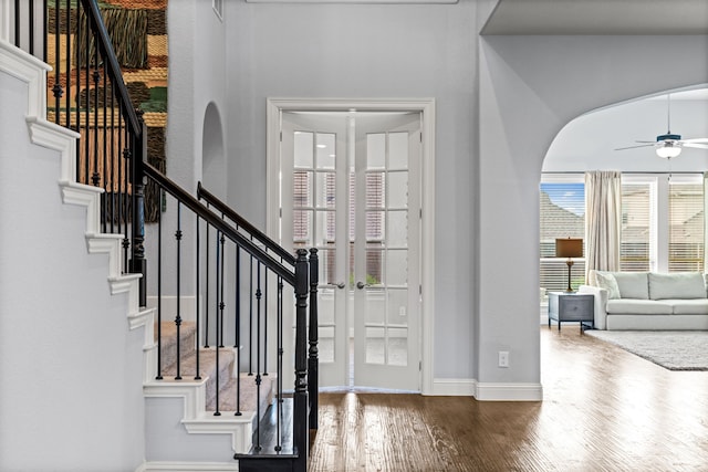 1020 Highpoint Way, Roanoke, TX 76262 - entryway featuring wood finished floors, ceiling fan, plenty of natural light, and baseboards