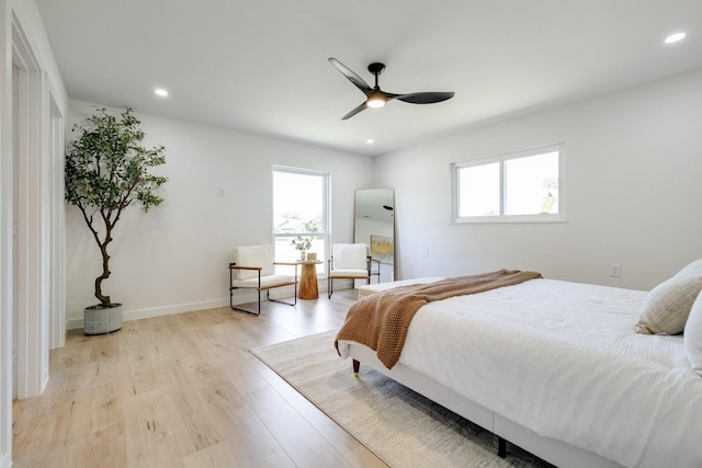 4128 Blackwillow Dr, Mesquite, TX 75150 - bedroom featuring multiple windows, light wood-style floors, recessed lighting, and a ceiling fan