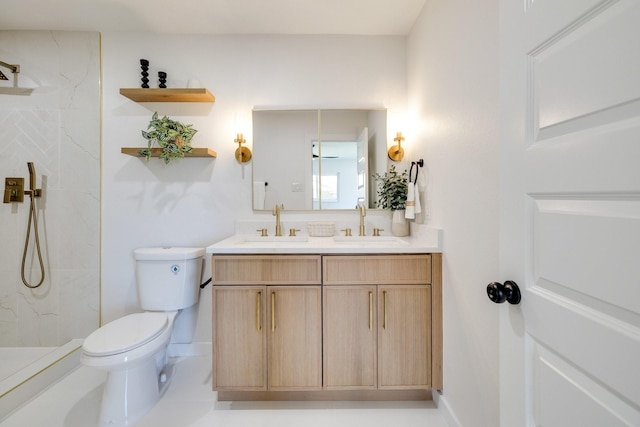 4128 Blackwillow Dr, Mesquite, TX 75150 - full bath with toilet, a marble finish shower, double vanity, and baseboards