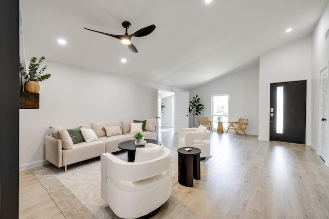 4128 Blackwillow Dr, Mesquite, TX 75150 - living room featuring vaulted ceiling, light wood-style flooring, a ceiling fan, recessed lighting, and baseboards