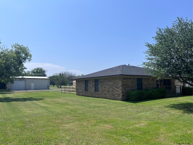 609 S 3rd St, Sanger, TX 76266 - view of yard with a garage and an outdoor structure