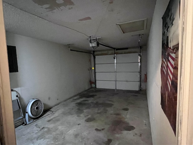 609 S 3rd St, Sanger, TX 76266 - garage featuring a garage door opener and electric panel