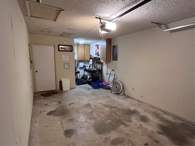 609 S 3rd St, Sanger, TX 76266 - garage featuring a garage door opener and electric panel