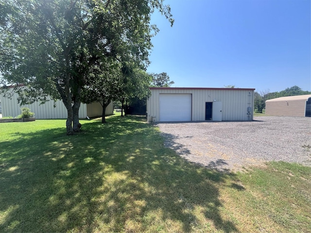 609 S 3rd St, Sanger, TX 76266 - detached garage featuring driveway