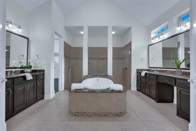 1070 Great Meadow Dr, Allen, TX 75013 - full bathroom featuring a stall shower, vaulted ceiling, tile patterned flooring, a garden tub, and baseboards