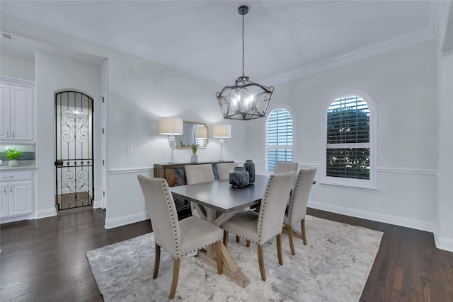 1070 Great Meadow Dr, Allen, TX 75013 - dining space with dark wood finished floors, a chandelier, baseboards, and crown molding