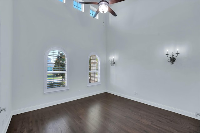 1070 Great Meadow Dr, Allen, TX 75013 - empty room with healthy amount of natural light, baseboards, ceiling fan, and dark wood finished floors