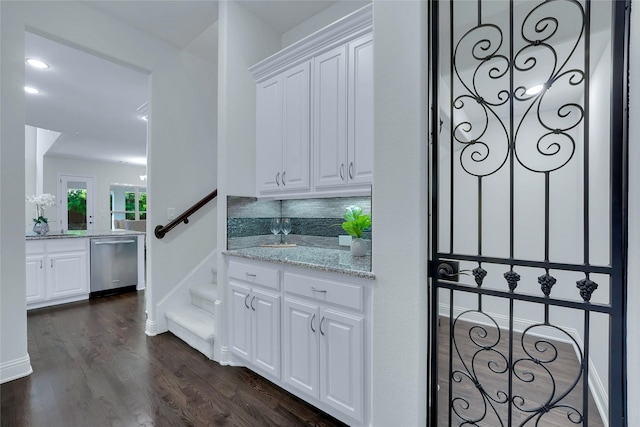 1070 Great Meadow Dr, Allen, TX 75013 - indoor bar featuring dishwasher, dark wood-style floors, tasteful backsplash, and stairs