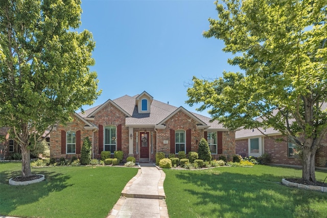 1522 Farm Dl, Allen, TX 75002 - traditional home with brick siding, a front yard, and roof with shingles
