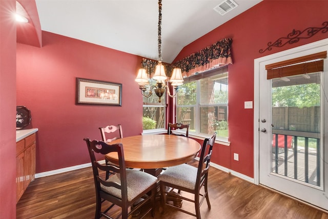 1522 Farm Dl, Allen, TX 75002 - dining room with vaulted ceiling, dark wood-style flooring, a chandelier, and baseboards