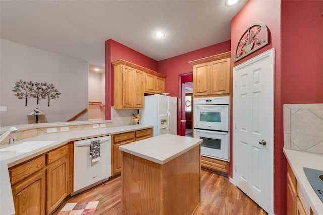 1522 Farm Dl, Allen, TX 75002 - kitchen with white appliances, a sink, light wood-type flooring, recessed lighting, and light countertops