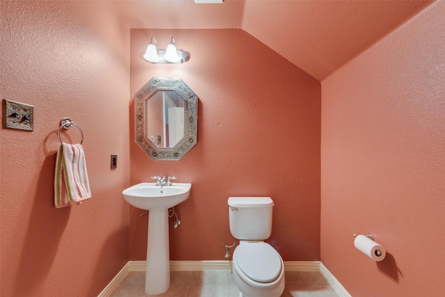 1522 Farm Dl, Allen, TX 75002 - bathroom with vaulted ceiling, tile patterned floors, toilet, and a sink