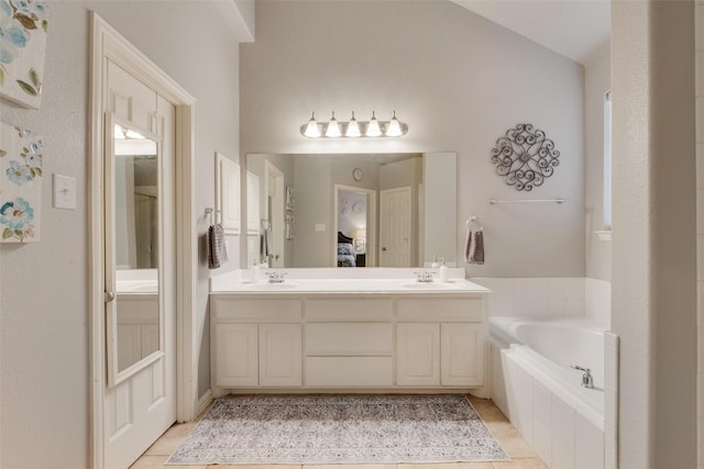 1522 Farm Dl, Allen, TX 75002 - bathroom featuring a garden tub, double vanity, tile patterned flooring, and connected bathroom