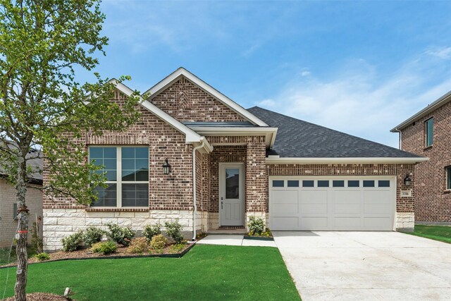 3316 Cross Shore Dr, Anna, TX 75409 - view of front of house featuring brick siding, an attached garage, roof with shingles, concrete driveway, and a front lawn