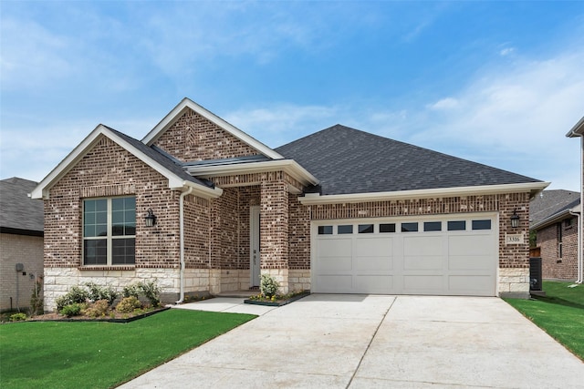 3316 Cross Shore Dr, Anna, TX 75409 - view of front of house featuring brick siding, roof with shingles, a garage, concrete driveway, and a front yard