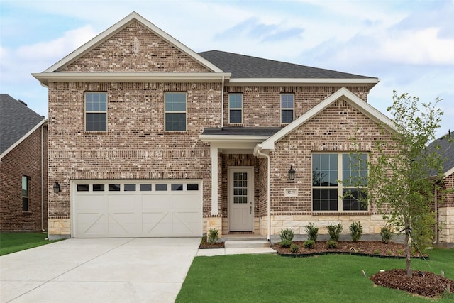 3229 Loftwood Ln, Anna, TX 75409 - view of front of house featuring an attached garage, driveway, a front lawn, and brick siding