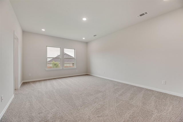3229 Loftwood Ln, Anna, TX 75409 - empty room featuring light colored carpet and recessed lighting