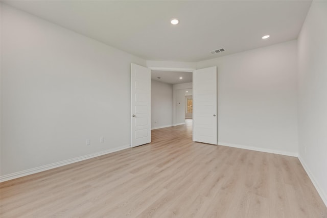 3229 Loftwood Ln, Anna, TX 75409 - empty room with light wood-style flooring and recessed lighting