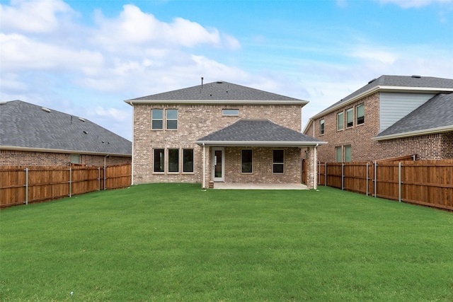 3229 Loftwood Ln, Anna, TX 75409 - back of property with a patio area, a fenced backyard, and brick siding