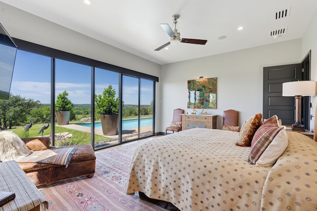 2333 County Road 163, Stephenville, TX 76401 - bedroom featuring access to outside, light wood-style floors, ceiling fan, and recessed lighting