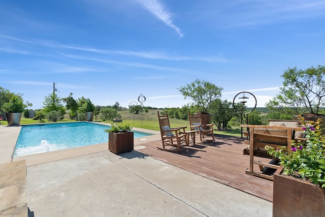 2333 County Road 163, Stephenville, TX 76401 - outdoor pool featuring a wooden deck and a patio