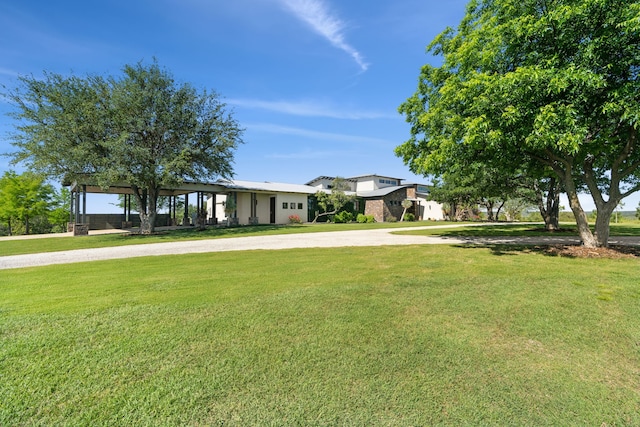 2333 County Road 163, Stephenville, TX 76401 - view of front of property featuring a front lawn and curved driveway
