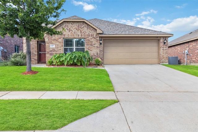 409 Hoover Ave, Lavon, TX 75166 - ranch-style house with brick siding, driveway, a front yard, and an attached garage