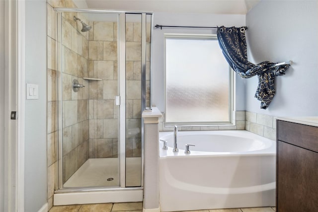 409 Hoover Ave, Lavon, TX 75166 - full bath featuring a shower stall, a garden tub, vanity, and tile patterned floors