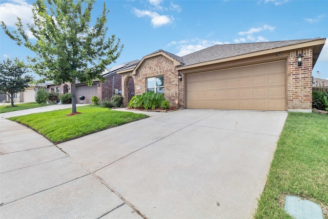 409 Hoover Ave, Lavon, TX 75166 - ranch-style house with brick siding, driveway, a garage, and a front lawn