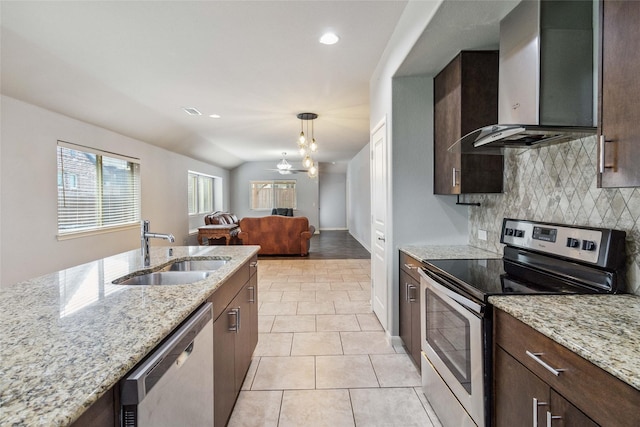 409 Hoover Ave, Lavon, TX 75166 - kitchen featuring stainless steel appliances, wall chimney range hood, backsplash, dark brown cabinetry, and light tile patterned floors