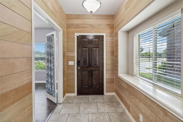 409 Hoover Ave, Lavon, TX 75166 - entryway with wood walls and healthy amount of natural light