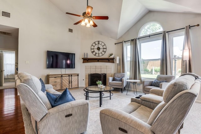 431 Lakefield Dr, Murphy, TX 75094 - living area featuring a ceiling fan, a fireplace, wood finished floors, and high vaulted ceiling