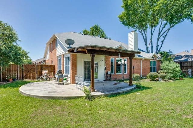 431 Lakefield Dr, Murphy, TX 75094 - rear view of property with brick siding, a chimney, and a patio