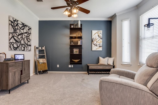 431 Lakefield Dr, Murphy, TX 75094 - sitting room featuring light colored carpet, crown molding, ceiling fan, baseboards, and healthy amount of natural light