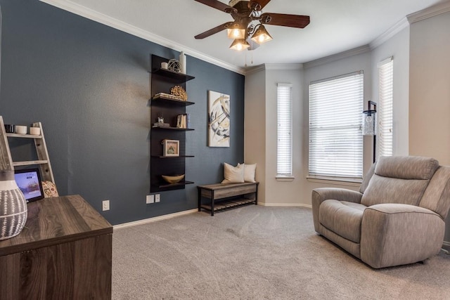 431 Lakefield Dr, Murphy, TX 75094 - living area featuring carpet flooring, a ceiling fan, baseboards, plenty of natural light, and crown molding