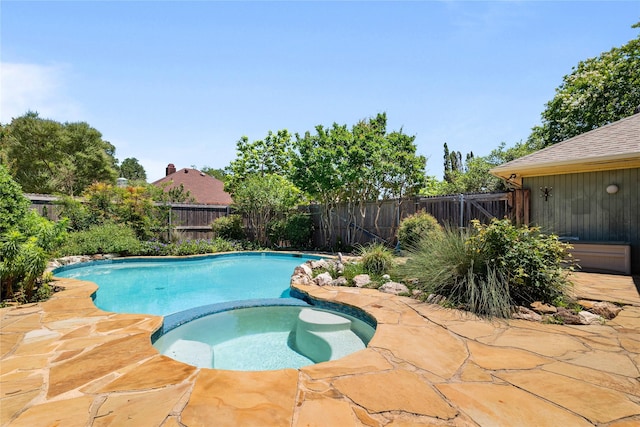 4001 Sonora Dr, Plano, TX 75074 - view of swimming pool featuring a fenced backyard, a patio, and a pool with connected hot tub