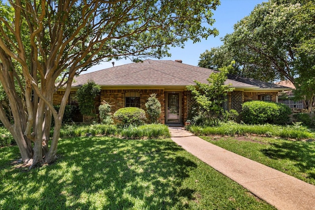 4001 Sonora Dr, Plano, TX 75074 - single story home featuring a front yard, brick siding, and roof with shingles