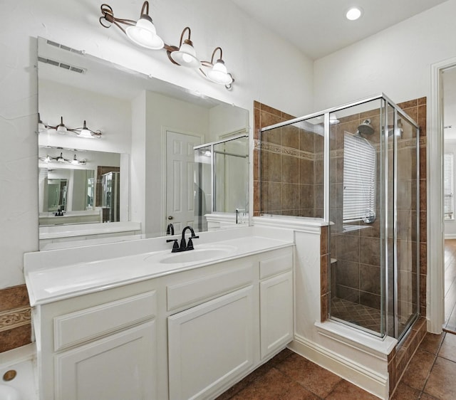 3816 Appleton Ln, Flower Mound, TX 75022 - bathroom with vanity, a shower stall, tile patterned flooring, and recessed lighting
